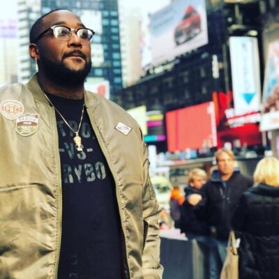 Thomas Fields Jr. standing in Times Square.