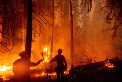 Firefighters battle the Creek Fire in the Shaver Lake community of Fresno County, California, on Sept. 7.