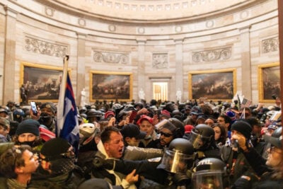 Police intervene as supporters of President Donald Trump breach security and enter the Capitol on Wednesday.