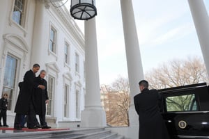 Then-President-elect Obama and President Bush leave the White House for the limousine ride to the Capitol for Obama's inauguration on Jan. 20, 2009. (Mandel Ngan/AFP/Getty Images)